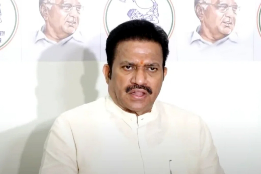 Why is there a cross marked over Ajit Dada's photo